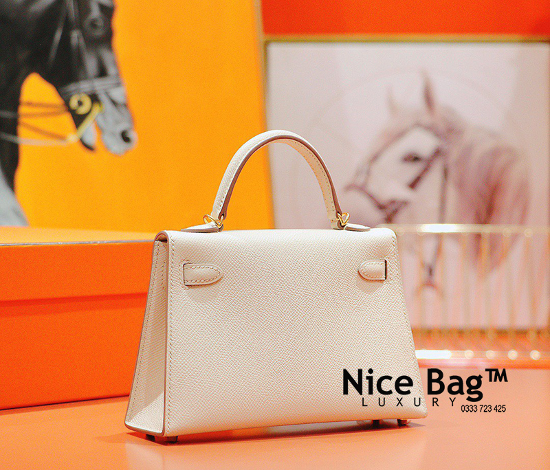 Hermes Kelly Bag Mini White like authentic sử dụng chất liệu chính hãng, sản xuất hoàn toàn bằng thủ công, cam kết chất lượng tốt nhất, chuẩn 99% so với chính hãng, full box và phụ kiện