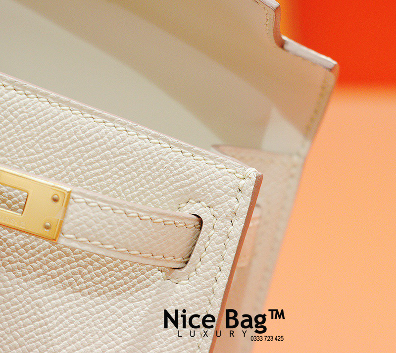 Hermes Kelly Bag Mini White like authentic sử dụng chất liệu chính hãng, sản xuất hoàn toàn bằng thủ công, cam kết chất lượng tốt nhất, chuẩn 99% so với chính hãng, full box và phụ kiện