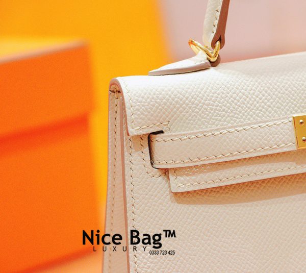 Hermes Kelly Bag Mini White like authentic sử dụng chất liệu chính hãng, sản xuất hoàn toàn bằng thủ công, cam kết chất lượng tốt nhất, chuẩn 99% so với chính hãng, full box và phụ kiện