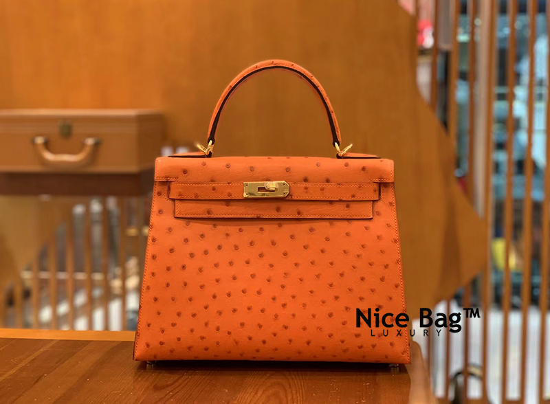 Hermes Kelly 28 Ostrich Orange like authentic cam kết chất lượng tốt nhất dùng không ai biết sử dụng chất liệu da đà điểu nam phi, may hoàn toàn bằng thủ công, full box và phụ kiện