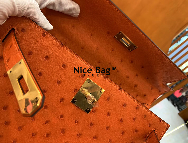 Hermes Kelly 28 Ostrich Orange like authentic cam kết chất lượng tốt nhất dùng không ai biết sử dụng chất liệu da đà điểu nam phi, may hoàn toàn bằng thủ công, full box và phụ kiện