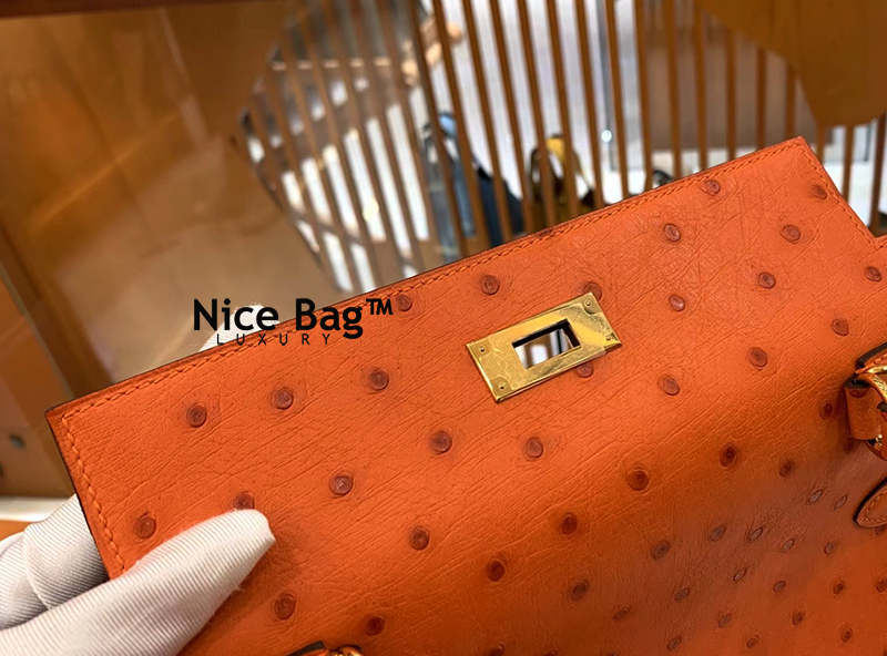 Hermes Kelly 28 Ostrich Orange like authentic cam kết chất lượng tốt nhất dùng không ai biết sử dụng chất liệu da đà điểu nam phi, may hoàn toàn bằng thủ công, full box và phụ kiện