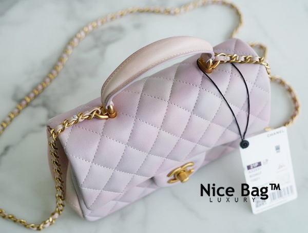Chanel Mini Flap Bag With Top Handle Lambskin Gold Tone Metal Light Pink Light Green like authentic chất lượng vip sử dụng chất liệu da cừu nguyên bản như chính hãng, được làm hoàn toàn thủ công, cam kết chất lượng tốt nhất chuẩn 99%
