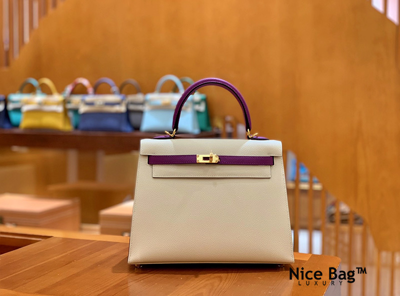 Hermes Kelly 25 HSS White Violet like authentic sử dụng chất liệu da bò dập vân nhập ý nguyên bản như chính hãng, được sản xuất hoàn toàn bằng thủ công, chuẩn 99%, full box và phụ kiện, hỗ trợ trả góp bằng thẻ tín dụng