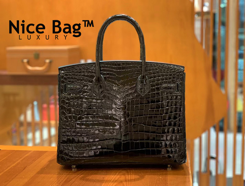 Túi Hermes Birkin 30 Porosus Crocodile Black With White Silver Hardware chất lượng like authentic, cam kết chất lượng tốt nhất, dùng không ai biết, sử dụng chất liệu da cá sấu bắc mỹ, được may thủ công bằng tay 100%, sử dụng chỉ sáp ong của pháp, full box và phụ kiện, hỗ trợ trả góp bằng thẻ tín dụng